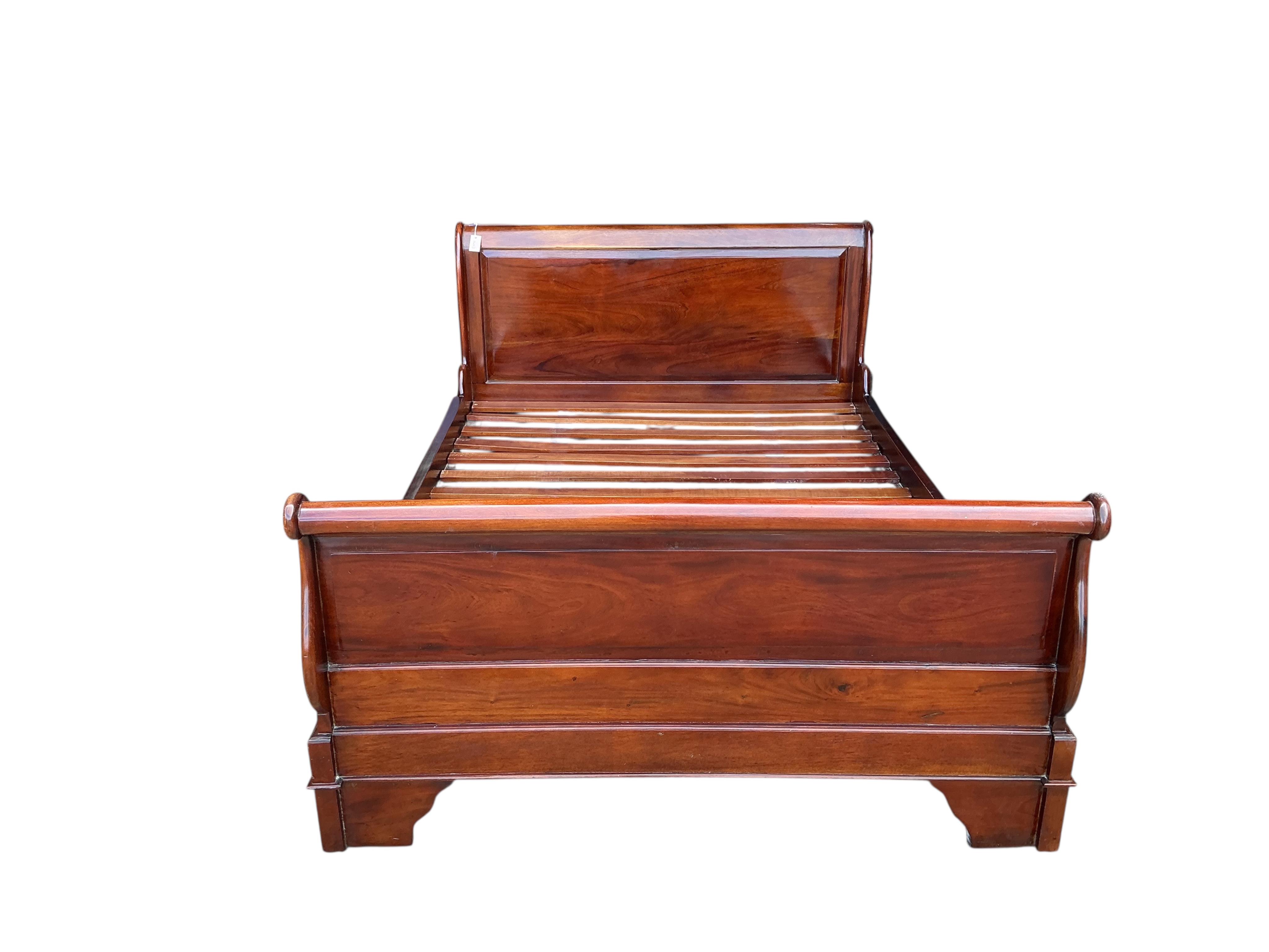 A reproduction mahogany sleigh bed, width 144cm, height 99cm